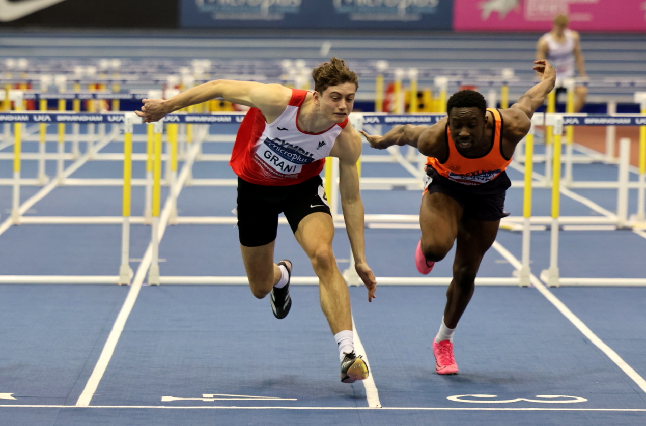 Iolo Grant lunges for the line as he takes silver.
